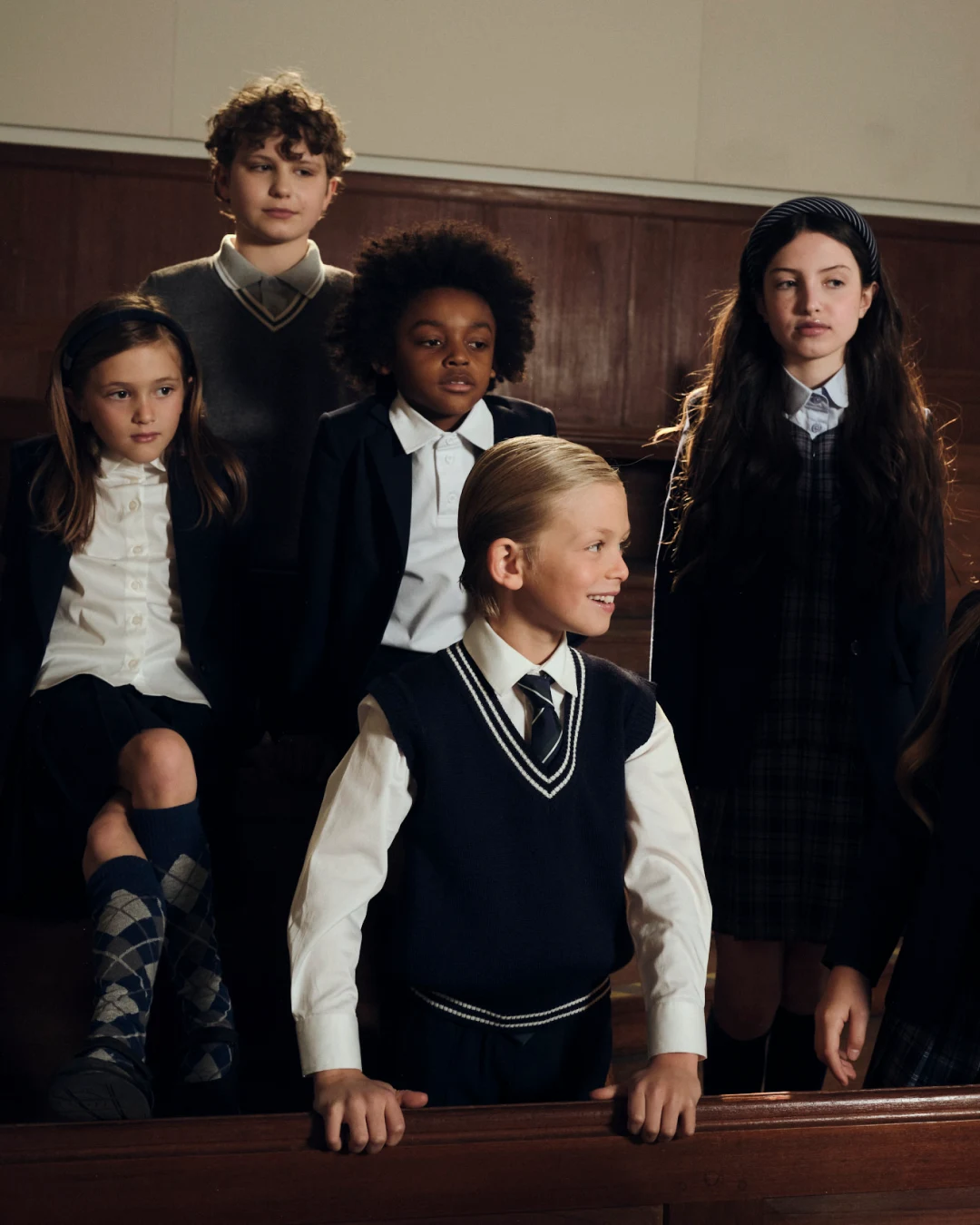 A group of students, each with their own way of wearing the school uniform